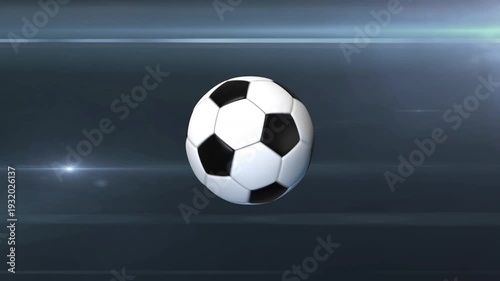 Classic soccer ball center frame with camera flashes on dark background loop.