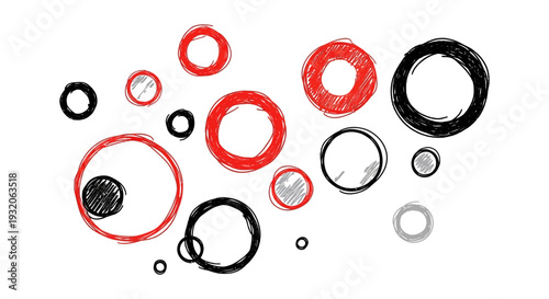 Abstract arrangement of hand drawn circles in varying sizes and shades