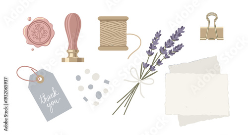 Crafting and stationery items arranged in a charming flat lay composition, featuring a wax seal, lavender, twine, and a thank you tag.