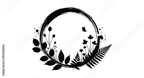 Black ink circle with botanical elements and scattered droplets on a white background