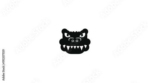A simple illustration shows a stylized, angry reptile head with sharp teeth and glaring eyes