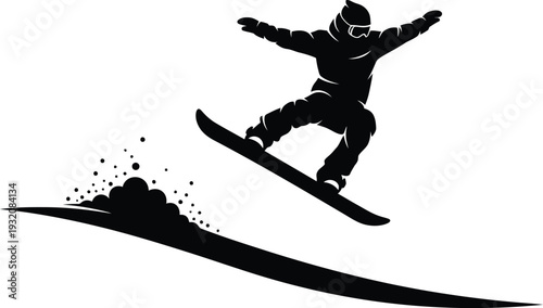 Snowboarder in mid air performing a trick on a snowy slope