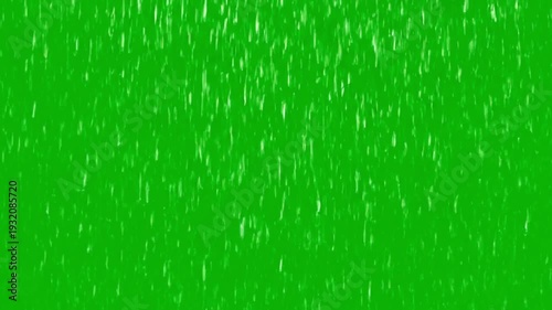 Rain Drops on Green Screen Background in Abstract Motion with Bright Lighting for Chroma Keying