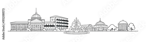 Central fountain surrounded by classical buildings in city square