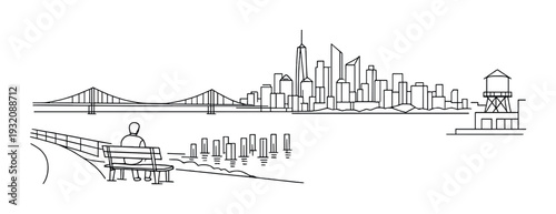 Person seated on bench overlooking city skyline and bridge