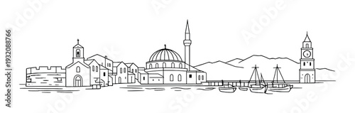 Seaside town with domed mosque and clock tower at harbor