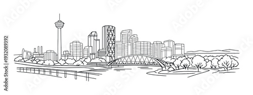 City skyline with illuminated skyscrapers and river bridge