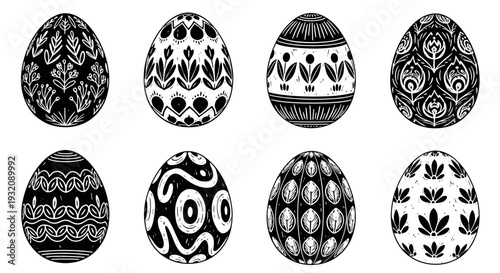 Set of eight decorative easter eggs with various black and white patterns