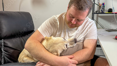 Konstfotografi A Caucasian man embraces a loyal dog in soulful connection, perfect for Love You