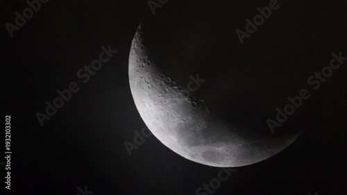 Footage of waxing crescent moon at night