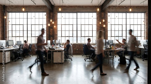 Dynamic motion blurs across an industrial-style open-plan office space with numerous employees working diligently at their individual desks.