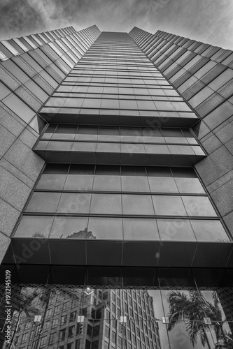 Upward View of a Glass Office Building in Black and White.