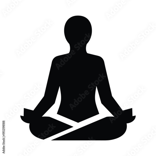 Silhouette of a person meditating in lotus position