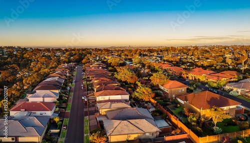 aerial view of suburban terrace houses in golden afternoon light in west melbourne in victoria