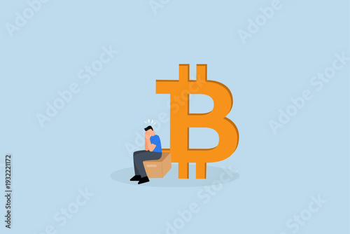 Fear, uncertain businessman investor is seated anxiously next to Bitcoin symbol