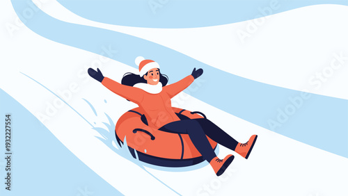 Happy young woman enjoying a thrilling winter ride on an orange snow tube down a snowy hill during the festive holiday season.