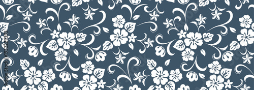 Hawaiian shirt pattern with hibiscus flowers, leaves, and branches. Complete artwork for fabric printing, designed for summer fashion, beach shirts, and casual wear. Not created by AI.