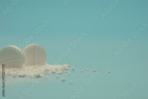 Minimal pharmaceutical concept with tablets and organic texture