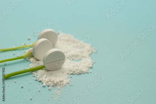 Minimal pharmaceutical concept with tablets and organic texture