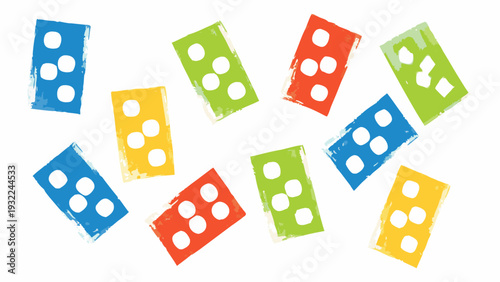 Colorful building blocks scattered against a plain white background