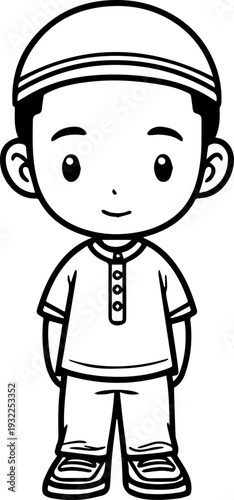 Smiling boy wearing traditional Muslim clothing and kufi cap