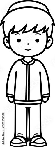 Smiling boy wearing traditional Muslim clothing and kufi cap