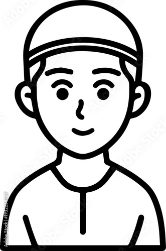 Smiling boy wearing traditional Muslim clothing and kufi cap