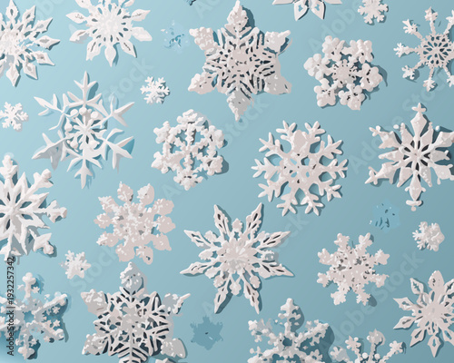 Delicate paper snowflakes scattered across a light blue background