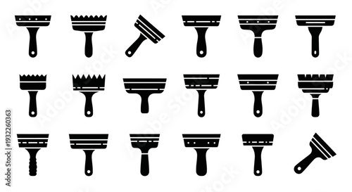 Collection of various razors and shaving tools displayed neatly on a clean surface