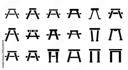 Ancient symbols arranged in a grid pattern on a white surface viewed from directly above