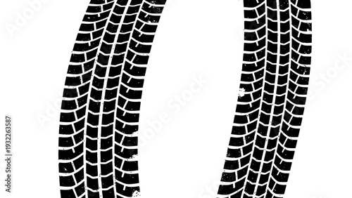 Closeup of car tire tracks.