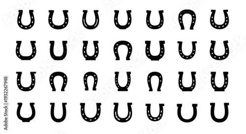 A grid of twenty-five horseshoes arranged in five rows on a plain surface viewed from directly above
