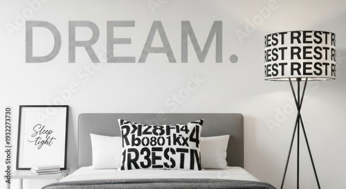 A modern bedroom with a motivational poster and stylish decor elements.