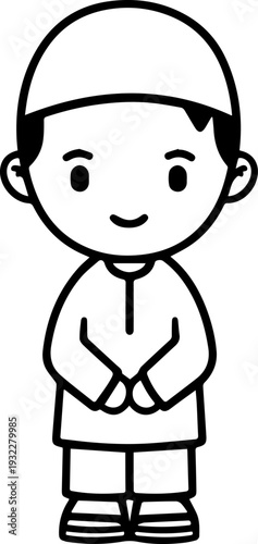 Smiling boy wearing traditional Muslim clothing and kufi cap