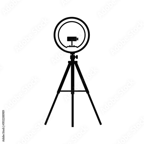 Black camera on tripod with softbox lighting equipment