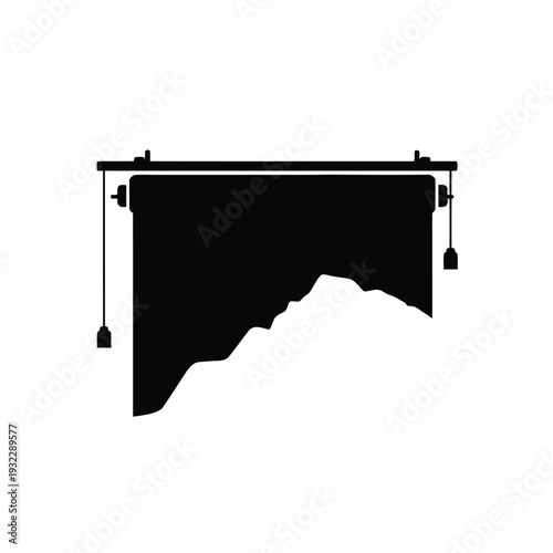 Black curtain with tassels on a rod window