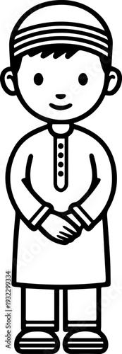 Smiling boy wearing traditional Muslim clothing and kufi cap