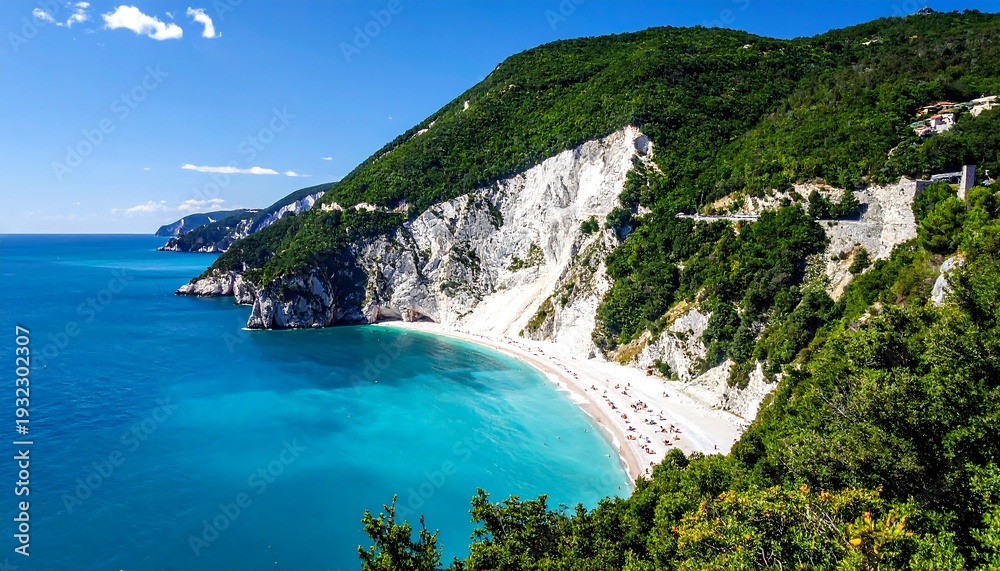 Fototapeta premium Serene coastal view featuring turquoise waters meeting a beach lined by white cliffs and lush, green hills under a blue sky