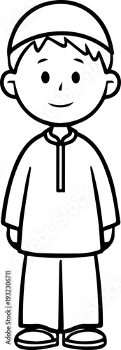 Smiling boy wearing traditional Muslim clothing and kufi cap