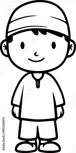 Smiling boy wearing traditional Muslim clothing and kufi cap