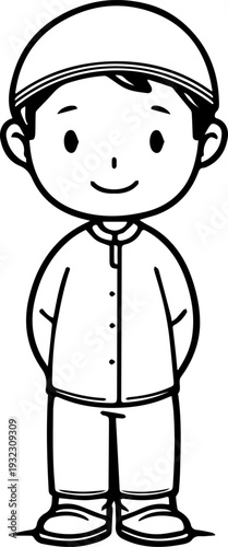 Smiling boy wearing traditional Muslim clothing and kufi cap