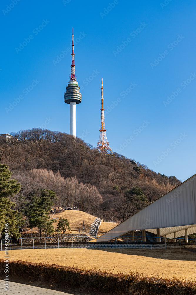 Obraz premium N Seoul Tower with autumn landscape. It is also known as Namsan Tower or Seoul Tower, the landmark which is a communication and observation tower located on Nam Mountain in central Seoul, South Korea