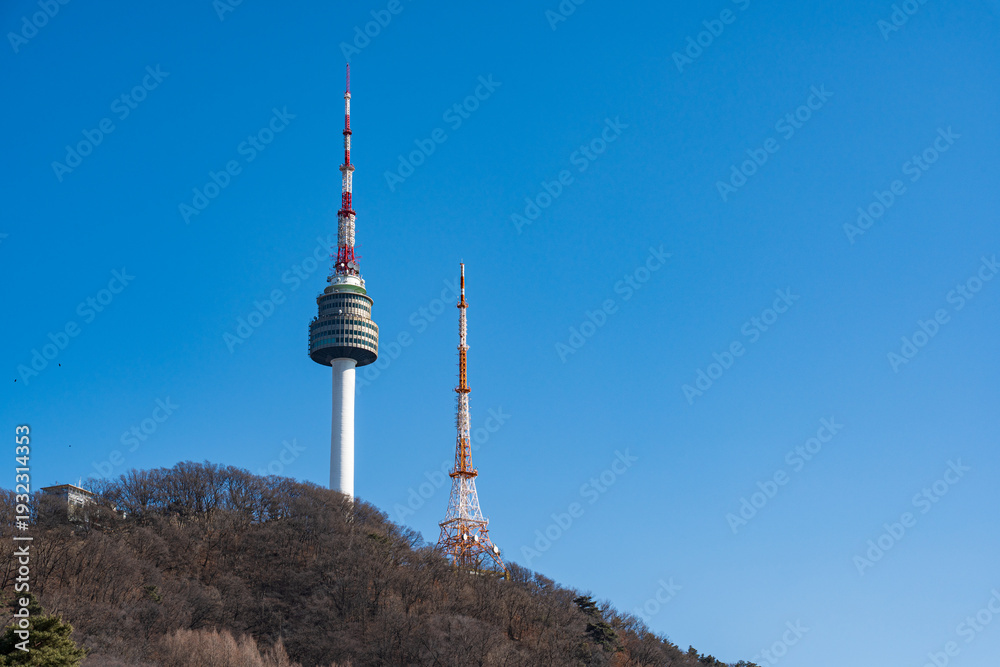 Obraz premium N Seoul Tower with autumn landscape. It is also known as Namsan Tower or Seoul Tower, the landmark which is a communication and observation tower located on Nam Mountain in central Seoul, South Korea