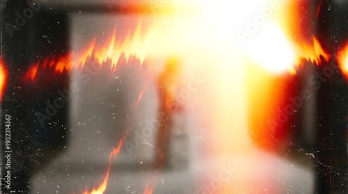 Intense Overexposed Yellow and Red Film Burn Explosion Effect with Heavy Vintage Grain
