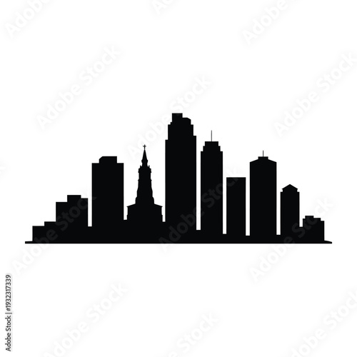 Silhouetted cityscape featuring modern skyscrapers and a prominent church spire