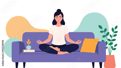 Young woman sitting in lotus pose on a purple sofa meditating in a peaceful home environment with plants and books.