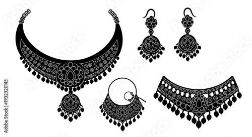 A detailed collection of ornate indian jewelry including necklaces and earrings presented as a silhouette on transparent background