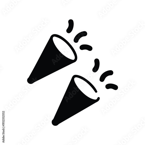 Two black party poppers going off in celebration, black and white image