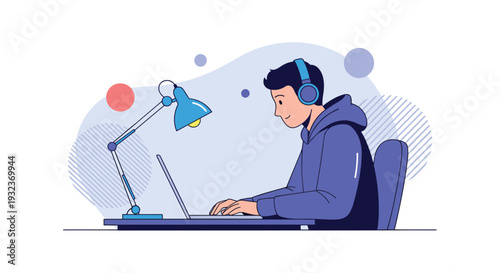 Young man wearing headphones and deeply focused on working or studying with a laptop at a modern desk equipped with a lamp.