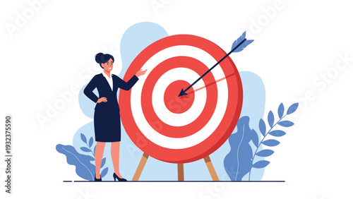 Professional woman in a business suit pointing at a large red target with an arrow perfectly placed in the bullseye.